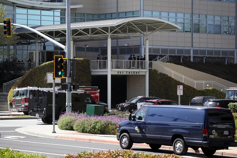 Police officers stand by in front of the YouTube headquarters on April 3, 2018 in San Bruno, California.